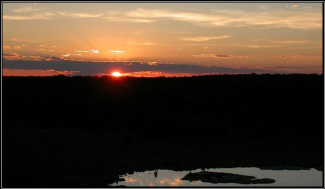 Halali sunset, Etosha National Park by Cuan Rush