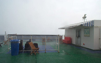 Deserted storm-lashed deck