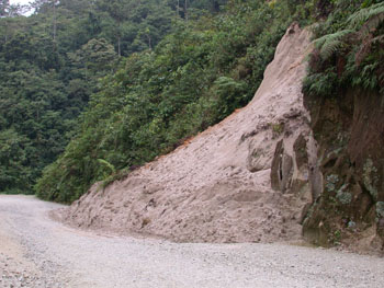 One of the frequent land-slips on the Tena road caused by the heavy rains