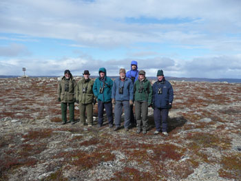 Hardy group members on a mountain top near Utsjoki on Day 11 posing after failing to find any Ptarmigan © Simon Linnington