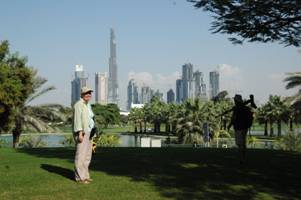 Boating pool at Safa Park with Dubai City skyline